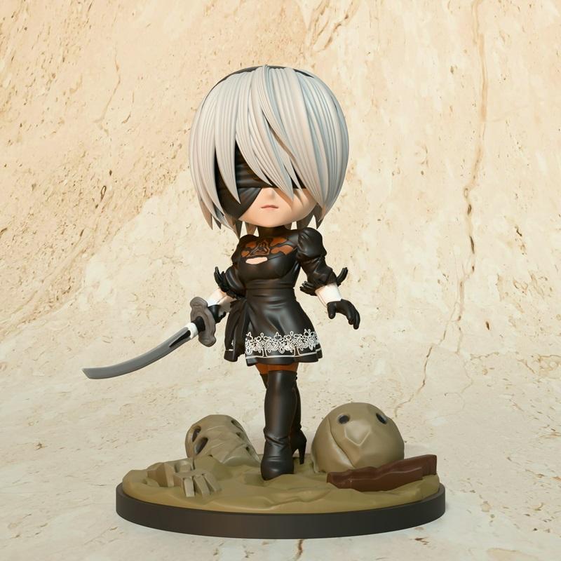 Chibi 2B from Nier Automata, wearing a black dress and blindfold, holding a sword, standing on a rocky base. Model by...