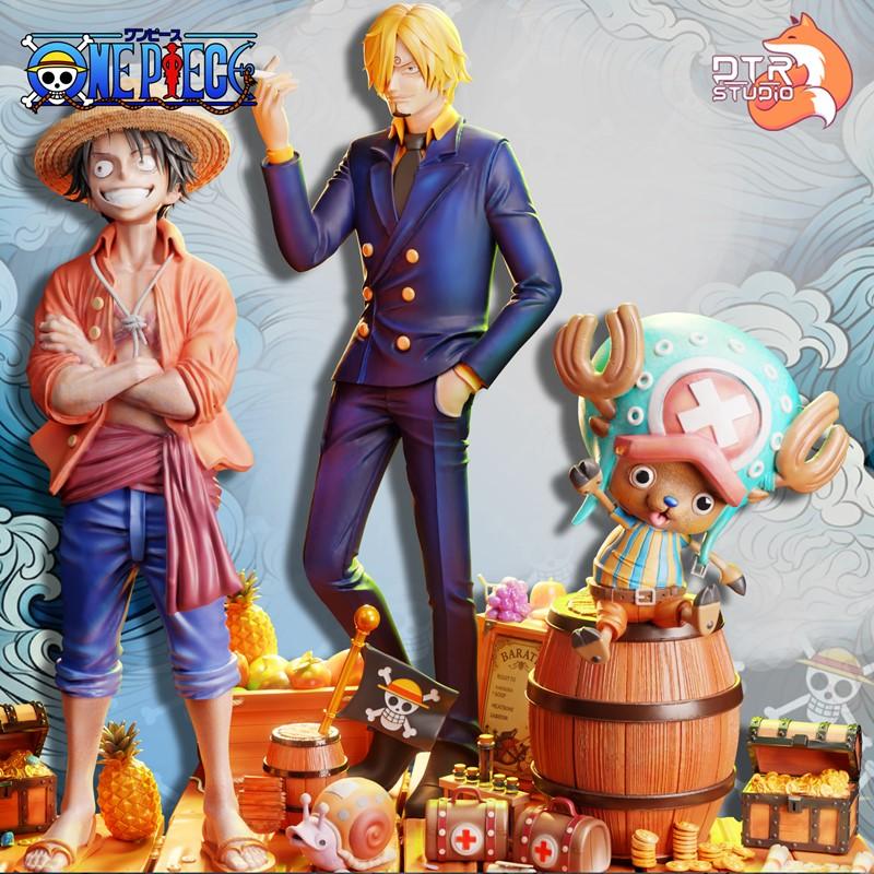 3D models of One Piece characters Luffy, Sanji, and Chopper. Luffy wears his signature straw hat and orange shirt. Sa...