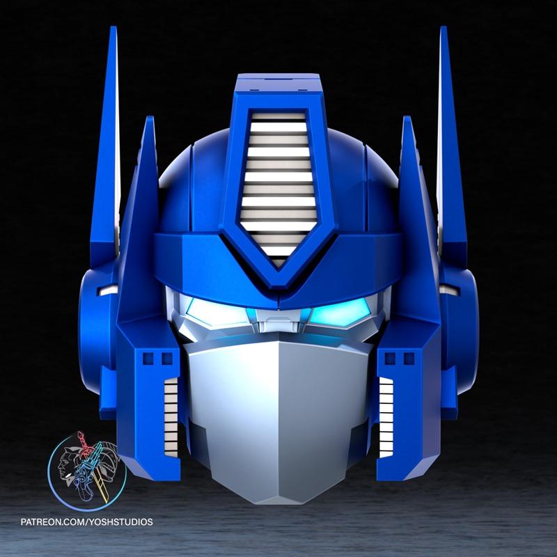 Close-up of G1 Optimus Prime helmet, a 3D model by Yosh Studios, with blue and silver metallic finish, glowing blue e...
