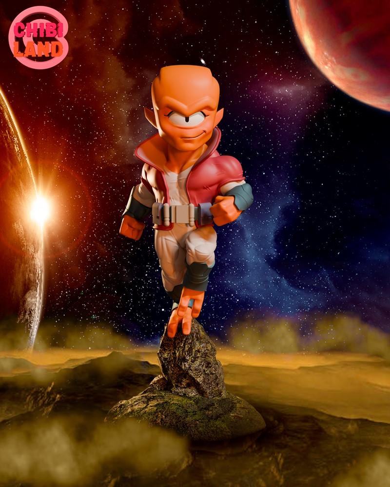 Chibi Frieza figure from Dragon Ball standing on a rock, wearing a red jacket and white pants, with planets and stars...
