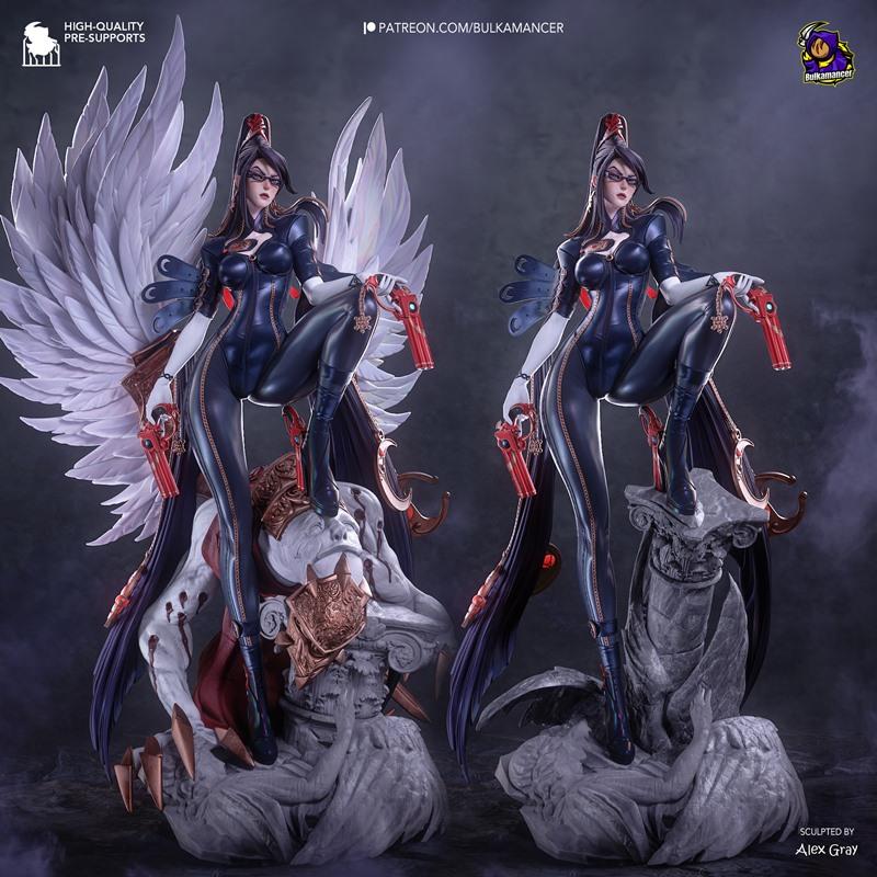 Bayonetta figure with large white wings and twin red pistols, posed heroically on a stone pedestal. Sculpted by Bulka...