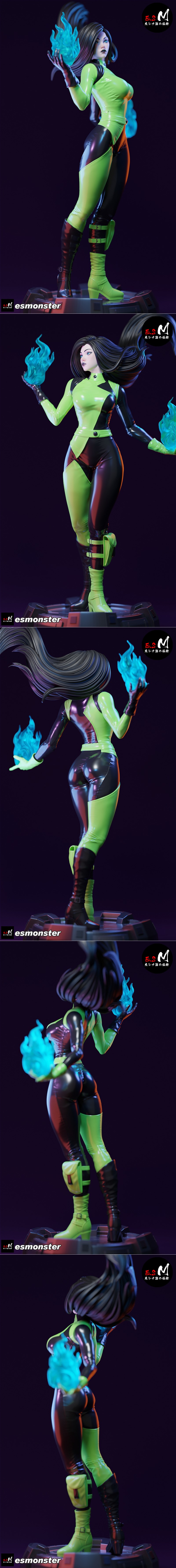 Shego figure in a green and black bodysuit, conjuring blue energy blasts with both hands, standing on a detailed base.