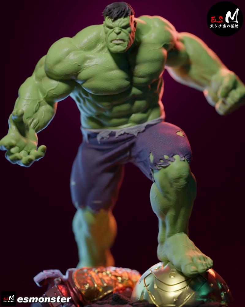 Muscular green Hulk figure with ripped purple pants, standing on a golden sphere, by E.S Monster.