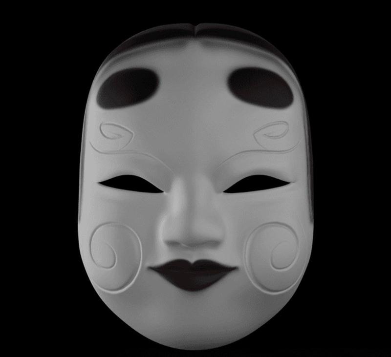 A white Kabuki Geisha mask with black eye sockets and dark lips, featuring swirling decorative patterns on the cheeks...