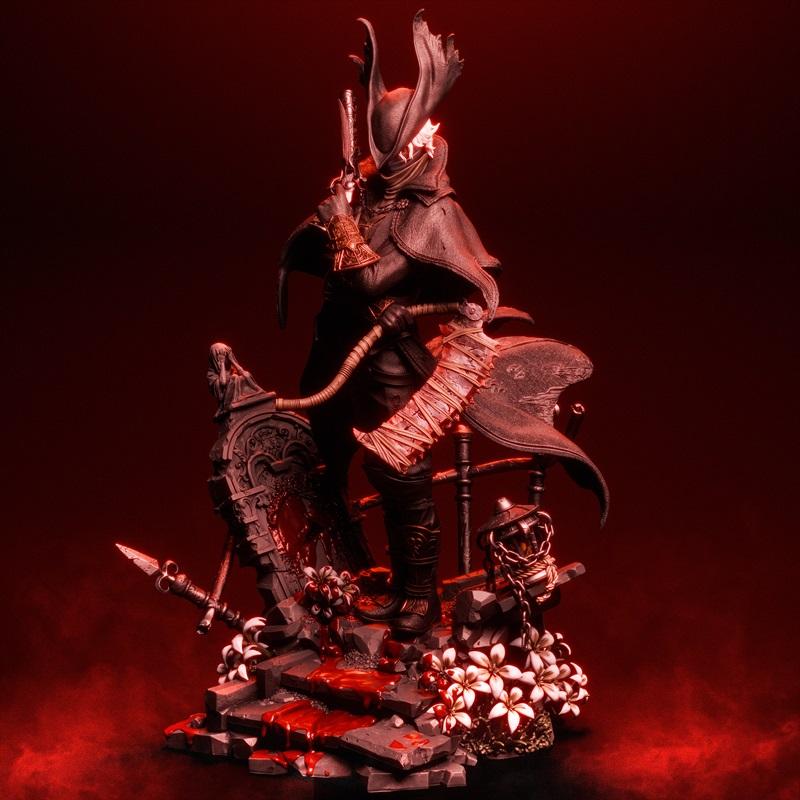 Bloodborne Hunter 3D model figure, wielding a Saw Cleaver and firearm, standing on a gothic base with blood and flowers.