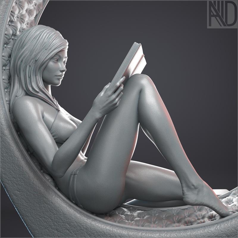 Aronon 3D model of a young woman reclining in a decorative chair, reading a book. Realistic sculpt with detailed hair...