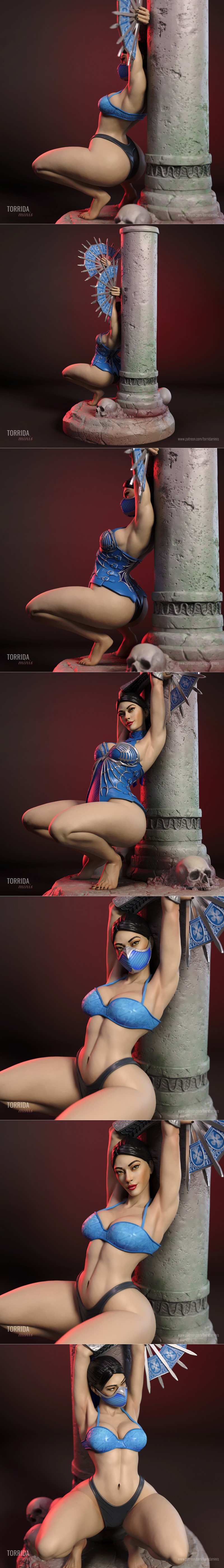 Kitana from Mortal Kombat crouching on a base with skulls, holding bladed fans, wearing a blue outfit and mask.