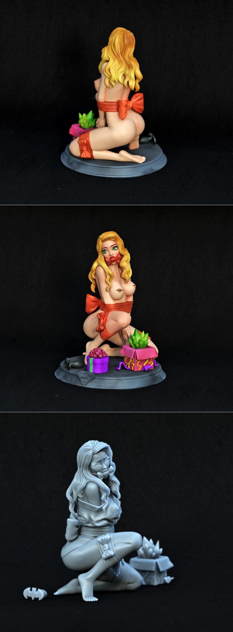 Super Girl 2.0 figure, bound and gagged, kneeling with gifts, wearing blue costume with 'S' shield, blonde hair, gree...