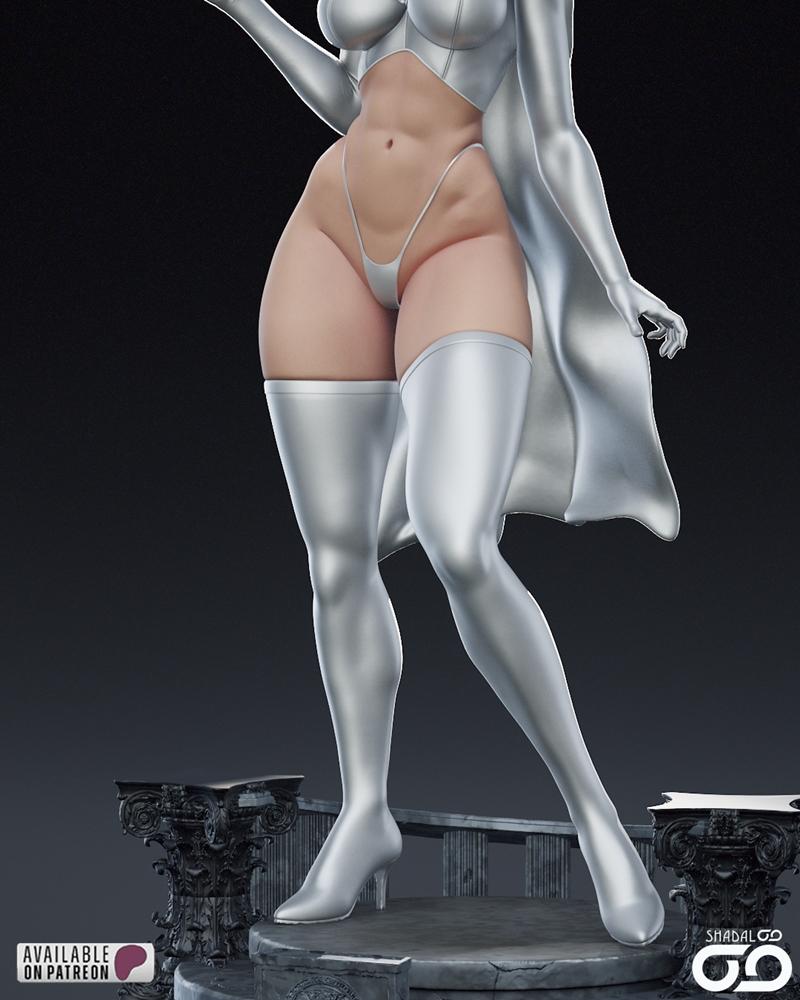 Emma Frost in white costume with cape and thigh-high boots, standing on a detailed base. Sculpted by Shadaloo Studios.