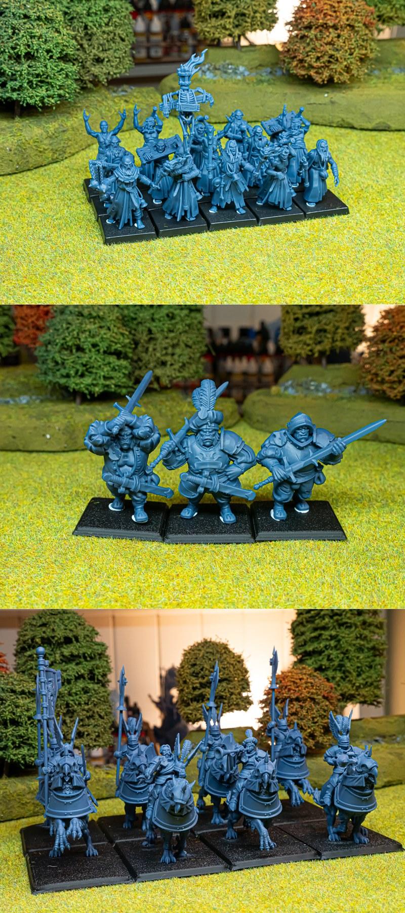 Collection of fantasy miniatures including knights on winged beasts and various foot soldiers with swords and spears.